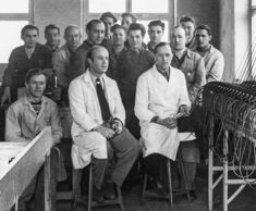 A group photo of the HBC team in 1950. A large order for the Portafon is shown on the right.