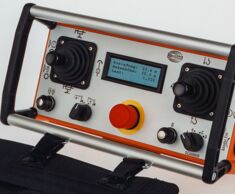 In 1993 HBC first presents a radio control with display for the indication of crane and machine data.