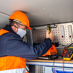 Service employee repairs radio control